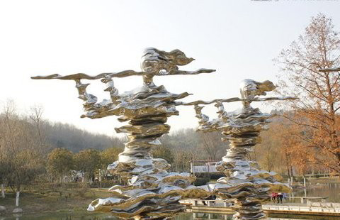 吹奏雕塑-景區不銹鋼抽象吹笛子人物雕塑吹奏雕塑 吹奏雕塑-景區不銹鋼抽象吹笛子人物雕塑吹奏雕塑高清圖片
